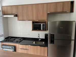 IDEA: 205C - DONO: THALITA E FELIPE · 2 quartos, telão, Wi-Fi, piscina e academia