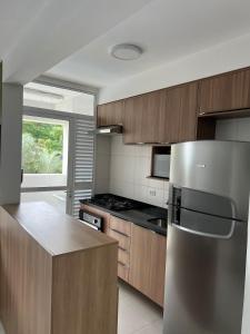 IDEA: 205C - DONO: THALITA E FELIPE · 2 quartos, telão, Wi-Fi, piscina e academia