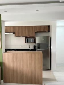 IDEA: 205C - DONO: THALITA E FELIPE · 2 quartos, telão, Wi-Fi, piscina e academia