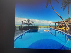 Sensacional apartamento pé na areia