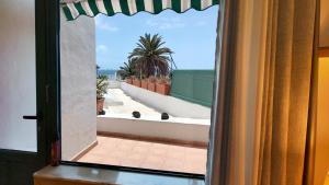 Lanzarote Beachfront Apartment on Las Cucharas Beach with a sea view