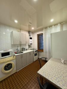 Суворова-Титова