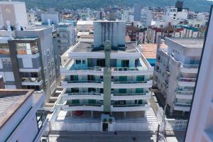 Ótimo apartamento na praia de Bombas.