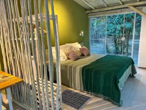 Suíte Tiê com vista para o lago