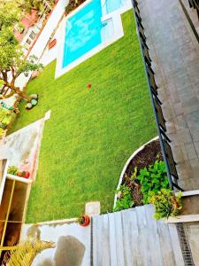 Espectacular casa con jardín y alberca privada