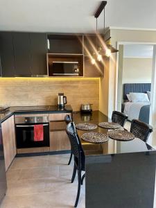 Central depto 2 dormitorios en distrito Icono