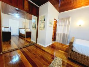 Rusty Blue Belize compound sleeps up to 22, bedrooms with AC, WiFi, Parking & hot baths