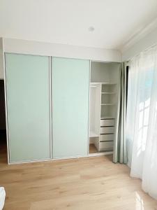 Queen room with shared bathroom