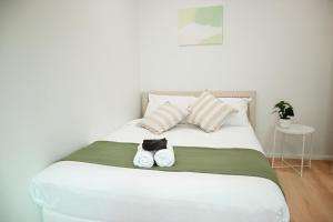 Queen room with shared bathroom