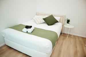 Queen room with shared bathroom