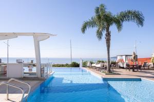 Apto Frente Mar Bali Beach Home Club 3 Quartos Climatizados Cozinha Completa Sacada com Churrasqueira 2 Vagas de Garagem Piscina borda infinita Sauna Academia Cinema Quadra Salão de Jogos Pé na Areia 15min do Beto Carrero