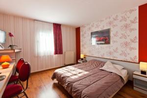 Hotels Cit'Hotel Du Circuit : photos des chambres