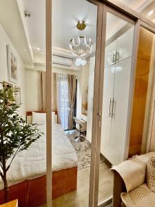 Walk to SM Mall, Near Airport, Disney plus, Netflix, Karaoke, WiFi