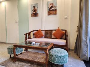 Bright Candolim 1BHK with Pool, Gym, Parking - 5 Minutes to Beach