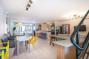 Casa familiar na exuberante praia de 4 ilhas.