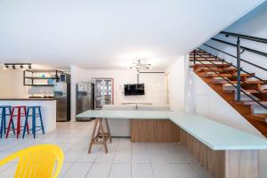 Casa familiar na exuberante praia de 4 ilhas.