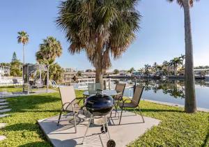 Oasis Waterfront Treasure Island Condo with Patio Dock and Johns Pass