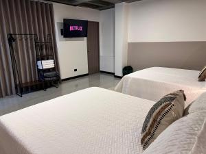 109- 209 Cómoda y amplia habitación diseñada para tu descanso