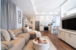 Modern 2BR Oasis with BBQ Sauna & Private Yard