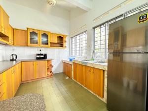 Modern Garden View Bungalow In Seremban by Maison