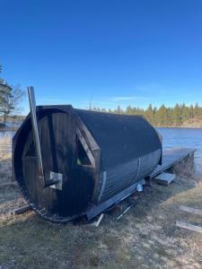 Accommodation near lake and forest including rowing boat