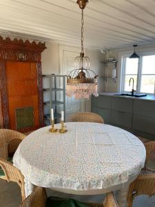 Accommodation near lake and forest including rowing boat