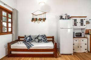 Charmoso chalé 5min da Praia do Estaleiro Churras&Pet OK