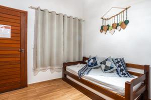 Charmoso chalé 5min da Praia do Estaleiro Churras&Pet OK