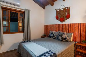 Charmoso chalé 5min da Praia do Estaleiro Churras&Pet OK