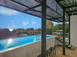 Luxury Villa with rooftop infinity pool and walk away from the beach