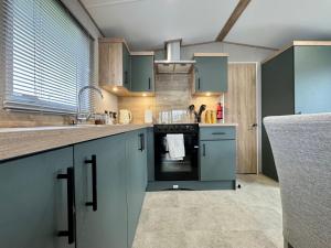 The Retreat - An Luxurious Caravan in Towyn, Wales