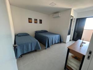 Apartamento com vista parcial do mar