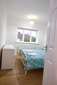 Stylish Wembley Home with Hot Tub, Parking & Garden