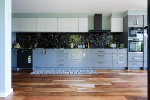 Elevated Modern Escape with Tennis Court Access