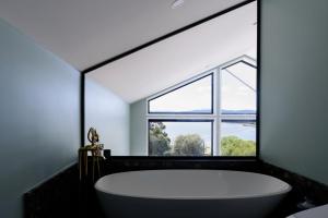 Elevated Modern Escape with Tennis Court Access