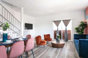 Central 4BR Townhome Modern Perks