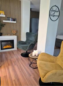 Strandstudio 19, Exklusive Wohnung, erste Reihe, eigener Strandkorb am Strand, Kamin