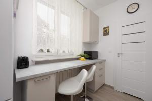 Beige Apartment near PGE and Park Praski Perfect for Remote Work by Noclegi Renters