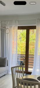 Biała Fala apartamenty nad jeziorem