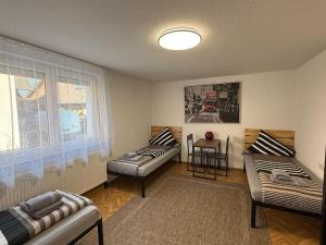 ARCOS Apartment - Geräumige 3-Zimmer-Wohnung mit 8 Einzelbetten - Perfekt für Familien, Gruppen oder Monteure - 3hvězdičkové hotely ve městě Kappel-Grafenhausen