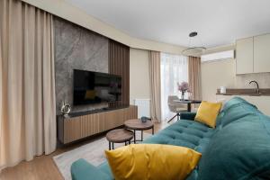 Stylish Apartment with Air Conditioning and Underground Parking by Noclegi Renters