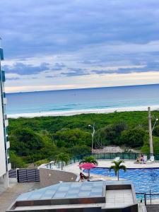 Apartamento aconchegante vista mar e piscina em cond de Arraial do Cabo