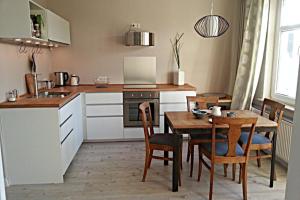 Haus MeerZeit - Ferienwohnung 2 Zimmer mit Balkon und Garten