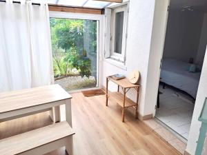Appartement cosy avec jardin - Stationnement gratuit
