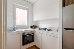 GuestHost - Bright Apartment M1 Precotto Milano