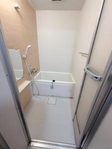Large two separated rooms with 5 beds in the Osaka
