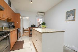 Stylish 3BR Loft - 10 Guests - Heart of Plateau