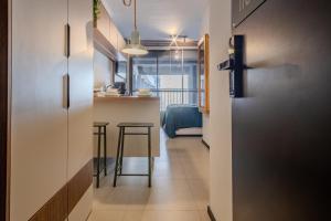 Studio Aconchegante e Moderno