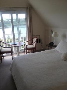 Deluxe Double Room with Balcony and Sea View room in Rocklands House Bed and Breakfast