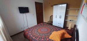 Quarto na praia da Pinheira